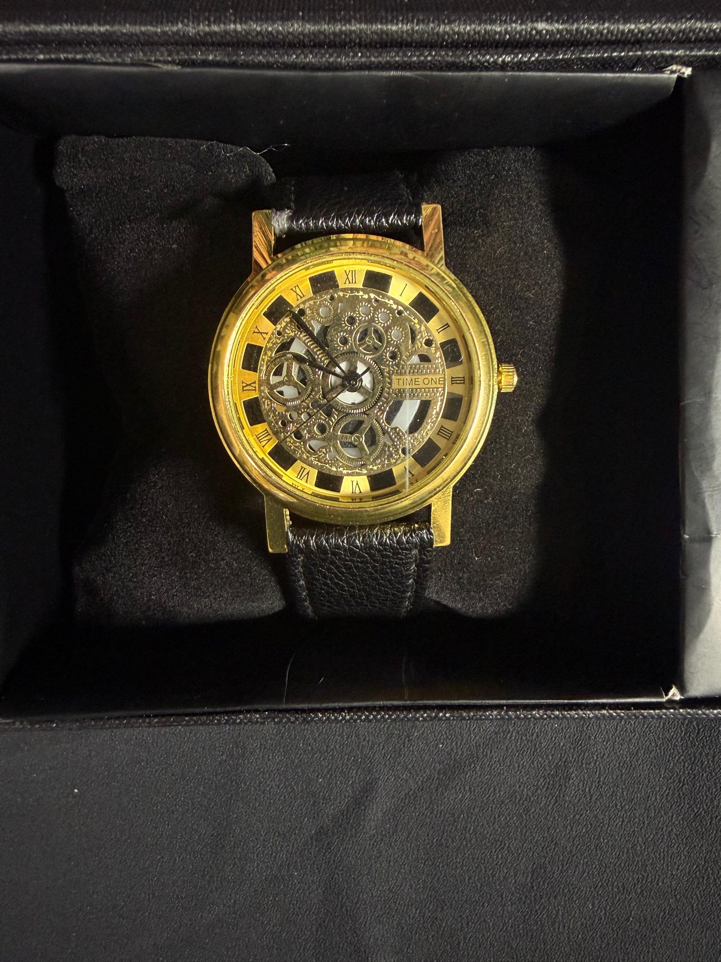 Gold Skeleton Watch
